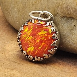 Aurora opal pendant set in sterling silver fire setting