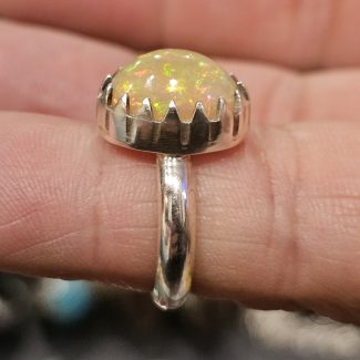 Ethiopian opal ring set in recycled sterling silver shark tooth bezel, size O