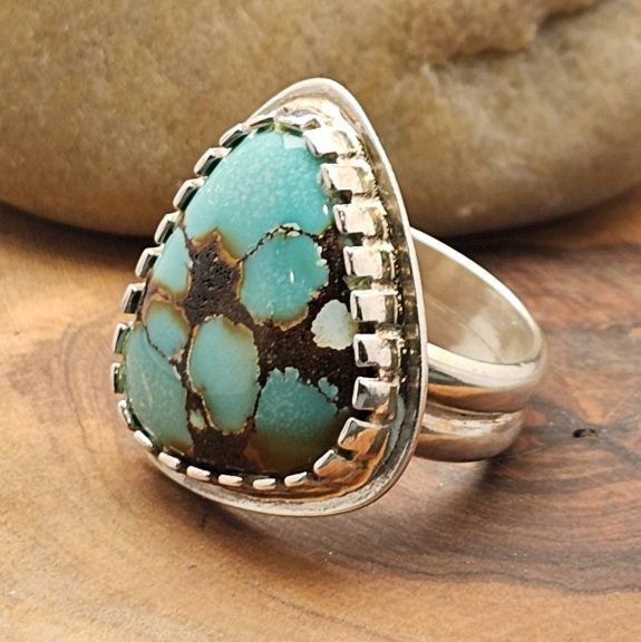 Handmade sterling silver turquoise ring with natural matrix